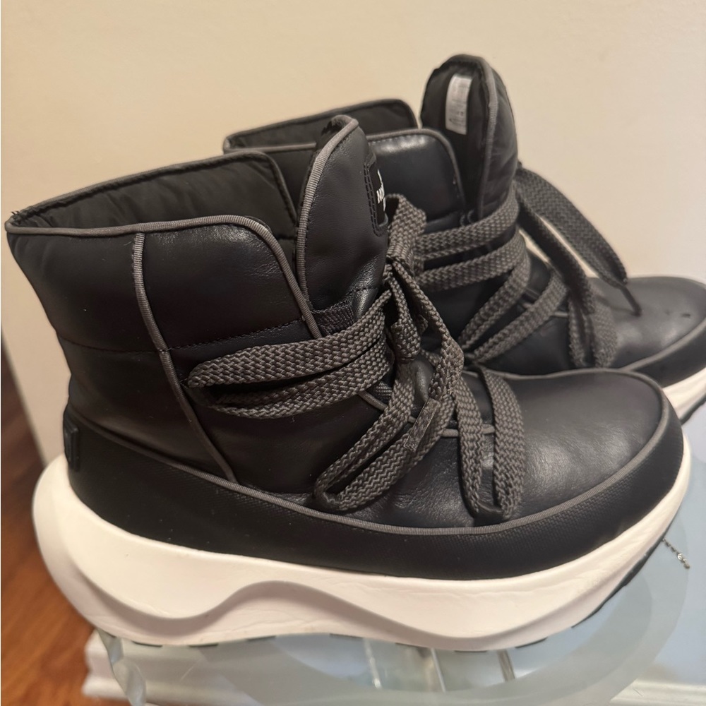 Black snow boots with White Soles